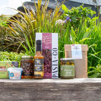 Food and drink products on a wooden ledge